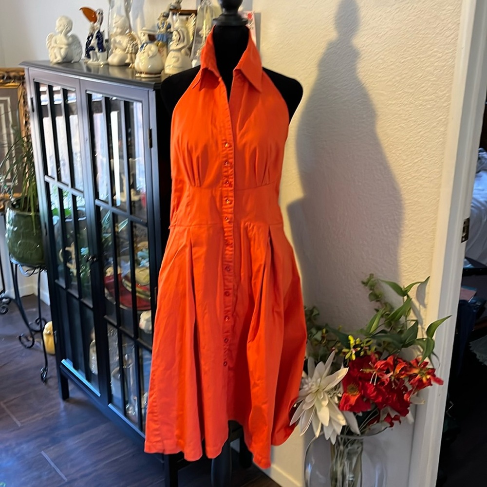 Amanda Charles backless orange dress it has elastic in the back a lot size 14
